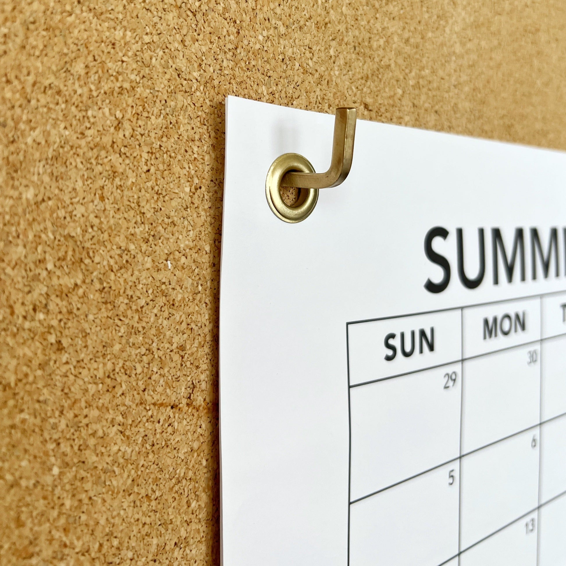 Brass Grommet on Calendar